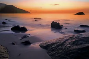 Retreat Prints: Beautiful sunset over calm waters at Beau Vallon beach in Seychelles