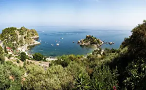 Guard Prints: Beautiful view of Isola Bella with clear water and boats in Taormina, Sicily