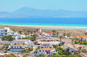 Roofs Prints: Beautiful view of Sotavento Beach and white houses in Fuerteventura