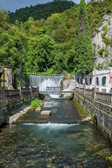 Flowing Prints: Beautiful waterfall flows into clear water in New Athon