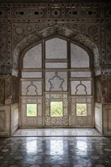 Glass Prints: Beautiful window design at Fort of Lahore showcasing intricate lattice work and stone flooring in Lahore