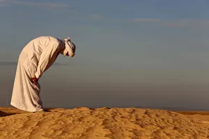 Dayime Prints: Bedouin praying in the Sahara, Douz, Kebili, Tunisia, North Africa, Africa