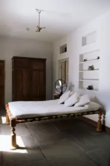 Simple Prints: Bedroom with traditional low slung bed or charpoy in a home in Amber