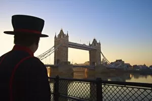 Images Dated 17th February 2008: Beefeater and Tower Bridge, London, England, United Kingdom, Europe