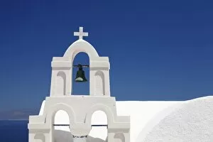 Bell tower of a white church, Oia, Santorini, Cyclades, Aegean Sea, Greek Islands, Greece, Europe