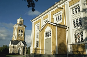 Bell tower and the worlds largest wooden church, dating from 1848