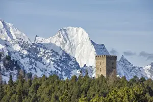 Forts Prints: The Belvedere Tower frames the snowy peaks and Peak Badile on a spring day, Maloja Pass