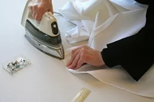 Images Dated 15th March 2006: Benedictine nun making religious vestment, Urt, Pyrenees Atlantique, France, Europe