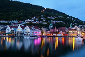 Bergens picturesque Bryggen District illuminated at dusk, UNESCO World Heritage Site, Bergen, Hordaland, Norway