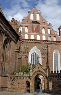 Lithuanian Prints: Bernardine church and monastery with a woman standing in the gateway