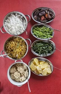 Images Dated 28th April 2010: Bhutanese dishes served at a restaurant in Thimphu rice and vegetables including chilli