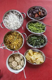 Bhutan Prints: Bhutanese dishes served at a restaurant in Thimphu rice and vegetables including chilli