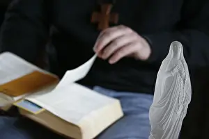 Books Prints: Bible reading, Evian, Haute Savoie, France, Europe