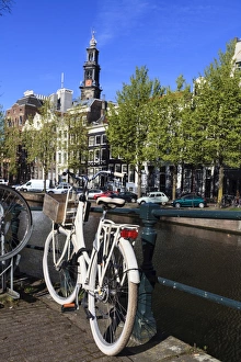 Westerkerk Prints: Bicycles by the canal, Amsterdam, Netherlands, Europe