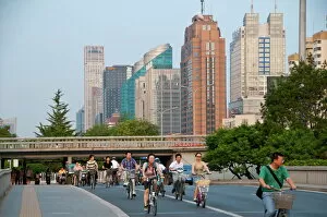 Images Dated 2nd August 2010: Bicycles and motorbikes in downtown Bejing, China, Asia