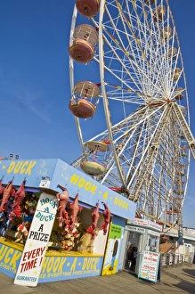 Ferris Wheels Prints: Big wheel and prize stall on the Central Pier, Blackpool, Lancashire, England