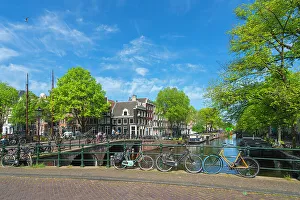 Amsterdam Prints: Bikes on bridge over Brouwersgracht canal, Amsterdam, The Netherlands, Europe