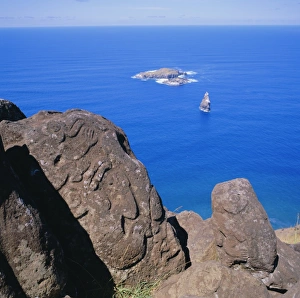 Petroglyph Prints: Birdman Petroglyphs at Orongo, the ceremonial village on Ranocau Crater rim; bird islands offshore are Motu Kao Kao