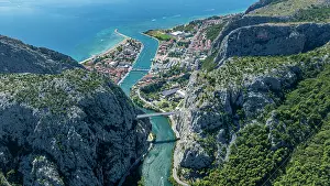 Hotels Prints: Bird's eye view of the river and town near the coast in Croatia during daytime
