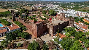 Sights Prints: Birds eye view shows fortified city of Silves in Algarve Portugal with its walls and surrounding landscape