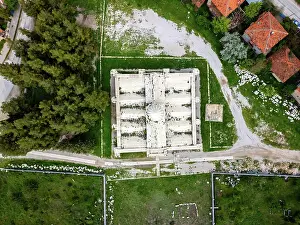 Turkish Prints: Bird's eye view of Suruz Caravanserai in Turkey showing its structure and surroundings during daylight