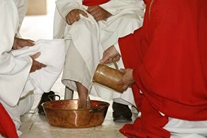 Bishop washing the feet of newly ordained deacons, Pontigny, Yonne, France, Europe