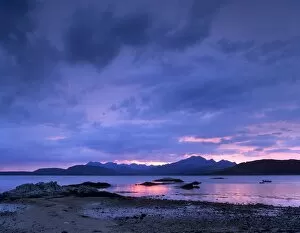 Dramatic Skies Collection: Black Cuillins range from the shores of Loch Eishort at dusk