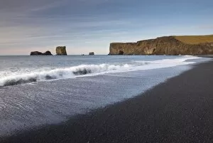 Black sand beach and Dyrholaey natural arch near Vik, south Iceland, Iceland