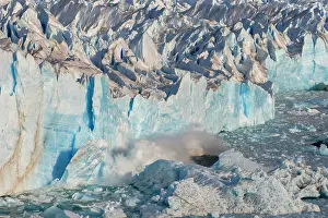 Glacier Prints: Block of ice breaks off from Perito Moreno glacier in Patagonia