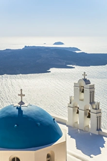 Blue dome and bell tower, St. Gerasimos church, Firostefani, Fira overlooking the Aegean Sea, Santorini (Thira), Cyclades Islands, Greek Islands, Greece, Europe