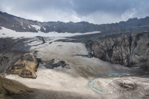 Blue glacial water in a glacier on Mutnovsky volcano, Kamchatka, Russia, Eurasia