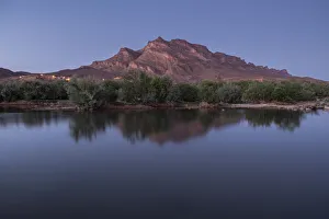 Draa Valley Prints: Blue hour in an oasis in the Draa Valley with a calm pond