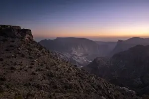 Blue hour on the rocky landscape of Jebel Akhdar mountains in Oman, Middle East