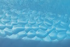 Glacial Prints: Detail of blue ice around the Antarctic Peninsula during the Austral summer months in Antarctica showing different ice