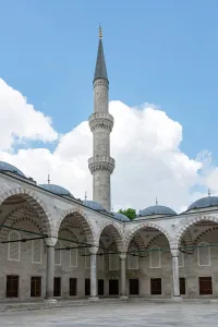 Courtyard Prints: Blue mosque stands proudly with its tall minaret in Istanbul