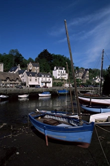 Brittany Prints: Blue sailing dinghy and River Aven, Pont-Aven, Brittany, France, Europe