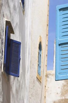 Essaouira Prints: Blue shuttered windows on houses in Medina, Essaouira, Morocco, North Africa, Africa
