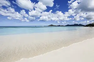 Antigua Prints: Blue sky frames the white sand and the turquoise Caribbean sea, Ffryes Beach, Antigua