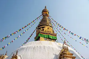 Stupa Prints: Blue sky and prayer flags at the large Swayambhu (Swayanbhunath) Stupa