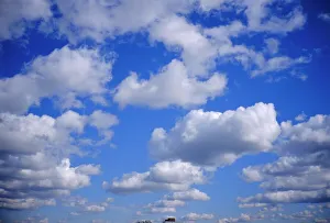 Blue sky and puffy white clouds