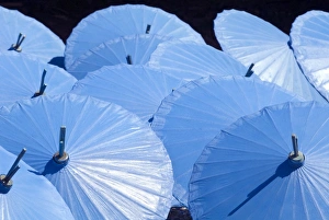 Uniformity Prints: Blue umbrellas drying in the sun, Borsang, Chiang Mai, Thailand, Southeast Asia, Asia