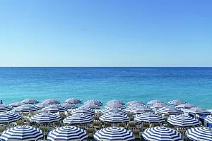 Vacations Prints: Blue and white beach parasols, Nice
