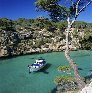 Balearics Prints: Boat anchored in rocky inlet, Cala Pi, Mallorca, Balearic Islands, Spain, Mediterranean