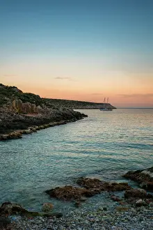 Peloponnese Prints: Boat on a beach bay at Cape Tainaron (Cape Matapan) at sunset