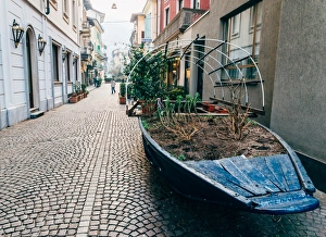 Innovation Prints: A boat filled with plants on a street in Stresa, Piedmont, Italy, Europe