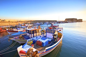 The boat lined Venetian Harbour and Fortress, Heraklion, Crete, Greek Islands, Greece