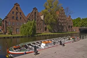 Boat on a little channel in front of the salt warehouses, Lubeck, UNESCO World Heritage Site