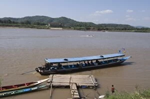 Boat on Mekong River, taken from Laos to Thailand on the opposite bank