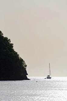 Windward Islands Prints: Boat moored off Marigot Bay at sunset, St. Lucia, Windward Islands, West Indies Caribbean