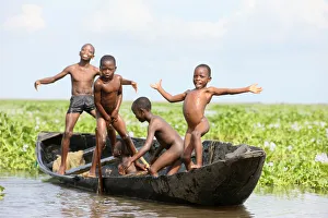 Child Prints: Boat near Ganvie lake village on Nokoue Lake, Benin, West Africa, Africa